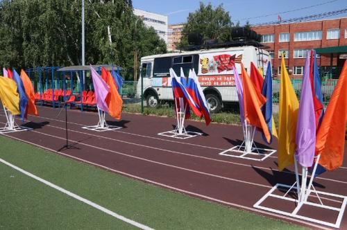 Флаги, песни, маски: как в Омске прошел День России?